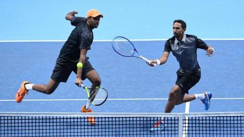 David Marrero y Tommy Robredo jugando al tenis